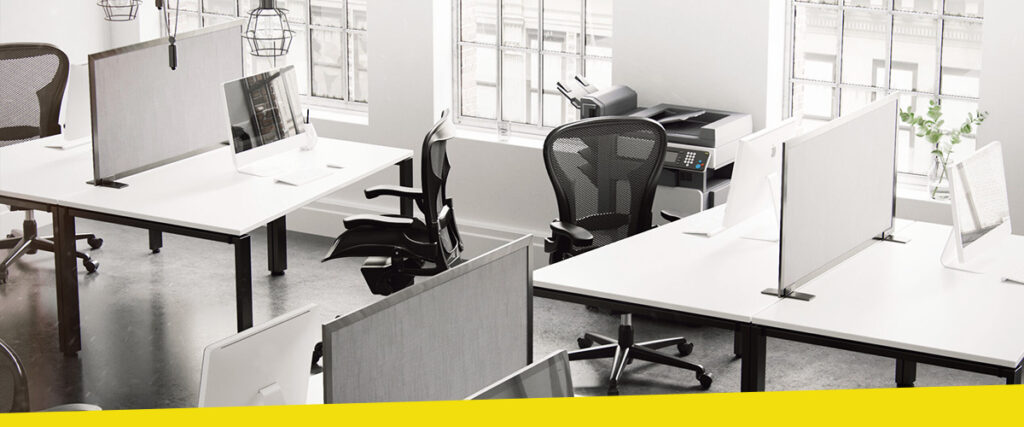 Black and white office furniture neatly organized